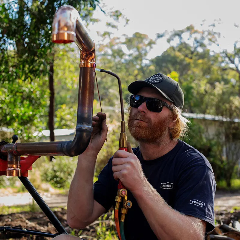 Chris Rogers installing bushfire sprinklers